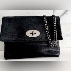 Italian Leather cross body bag with gun metal chain strap.